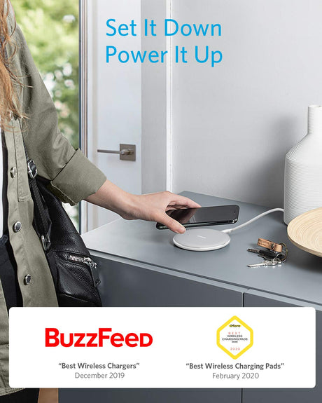 White Anker 313 wireless charging pad for smartphones, sleek and compact with a smooth surface for easy wireless charging.