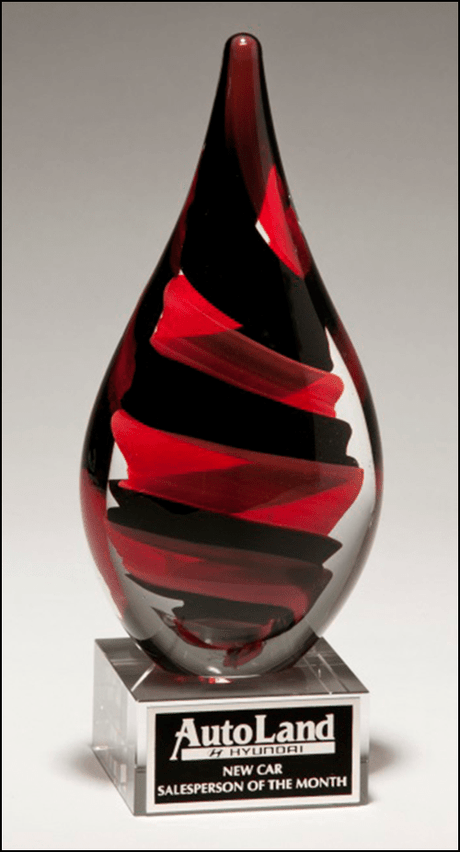 Airflyte art glass awards featuring clear rectangular glass with engraved detailing and a sleek, modern design.