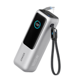 Anker 25K 165W laptop power bank with built-in retractable cables for portable device charging.