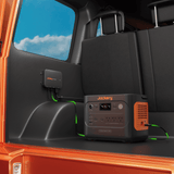 Image of Jackery DC-DC Alternator Charger, a portable device used to efficiently charge batteries, with visible connectors and branding.