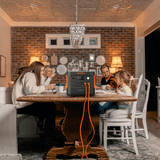Refurbished Jackery Explorer 2000 V2 portable power station with multiple outlets and digital display for outdoor and backup power.