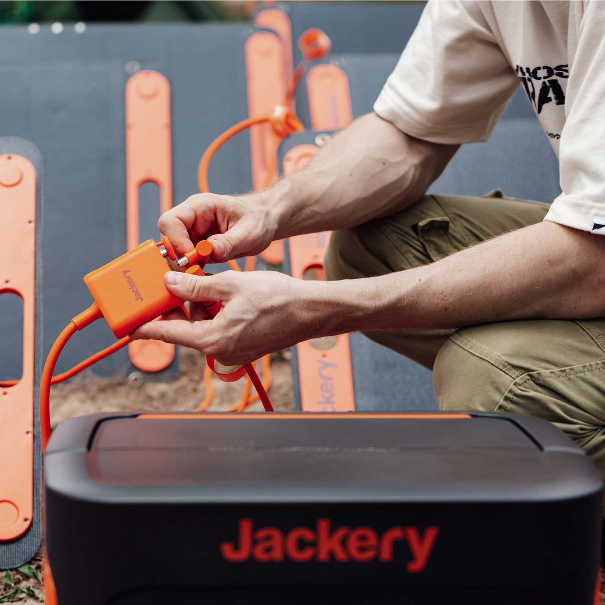 Jackery Solar Panel Connector for portable solar power systems, showing a compact, durable connector with brand logo.