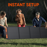 Jackery SolarSaga 200W solar panel outdoors, showing black photovoltaic cells and portable design for solar energy collection.