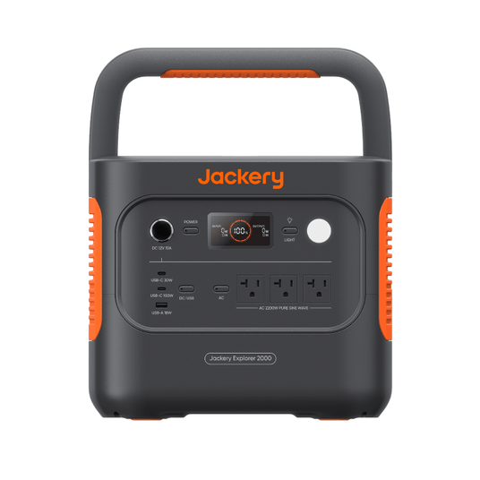 Jackery Explorer 2000 V2 portable power station with solar generator setup, showing its compact design and multiple output ports.