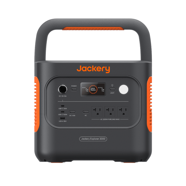 Jackery Explorer 2000 V2 portable power station with solar generator setup, showing its compact design and multiple output ports.